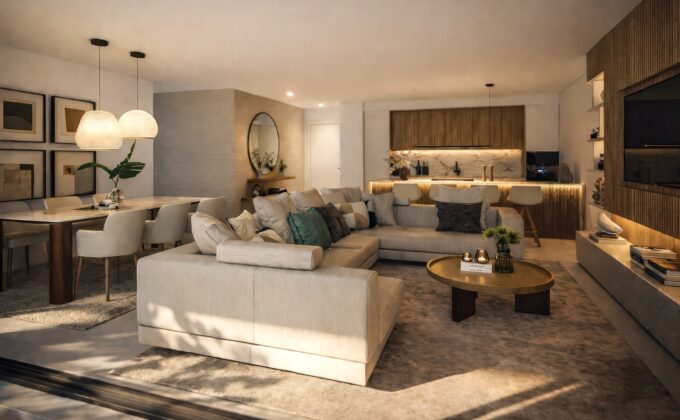 Elegant open-plan living room with sectional sofa, dining area, modern kitchen, warm lighting and natural wood finishes.