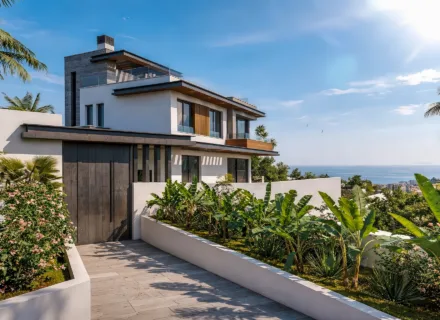 Modern tropical villa with rooftop terrace and ocean view at One Bali Villas