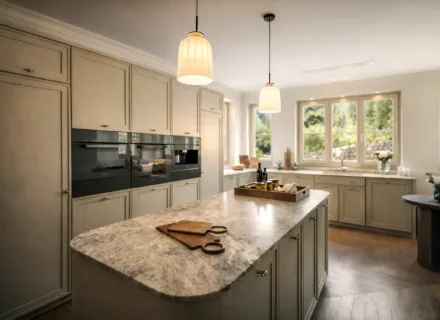 Luxury kitchen at Villa Liora in Marbella with large island, integrated appliances, soft lighting and elegant neutral tones