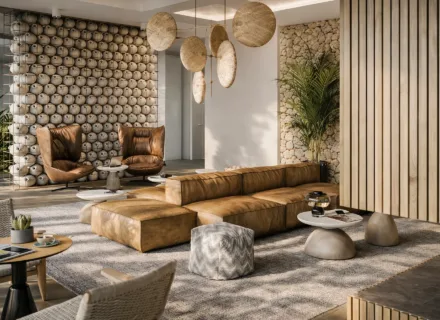 Stylish social lounge at Ayana Estepona with designer sofas, natural materials, artistic wall features and warm, inviting ambiance.