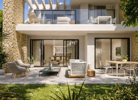 Elegant Ayana Estepona apartment with private terrace and garden, outdoor lounge area, modern design and natural materials.