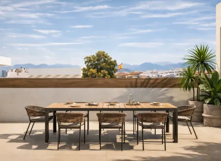 Luxury rooftop dining terrace with mountain views at Alcántara del Mar Mile residence