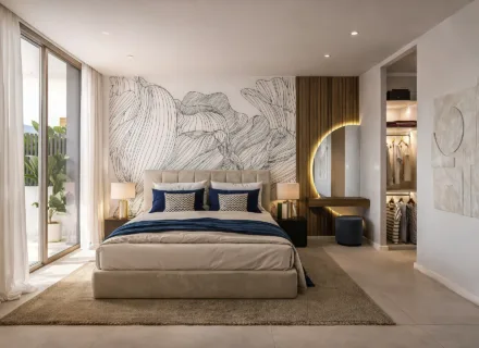 Nowoczesne apartamenty w Esteponie na sprzedaż – elegancka sypialnia z dużym łóżkiem i wyjściem na taras