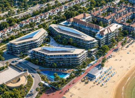 Vesta Mare Manilva – widok z lotu ptaka na nowoczesny kompleks apartamentów przy plaży z basenem i promenadą