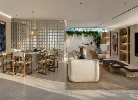 NACARE Luxury Estepona przestronny salon połączony z jadalnią w eleganckim, nowoczesnym stylu